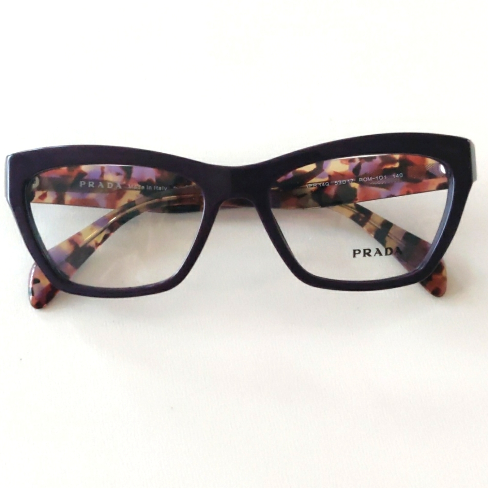 Prada 14PV Glasses. Plum. 55-17-145
